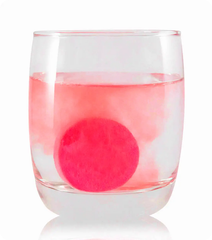 Drop 1 tablet into a glass of water